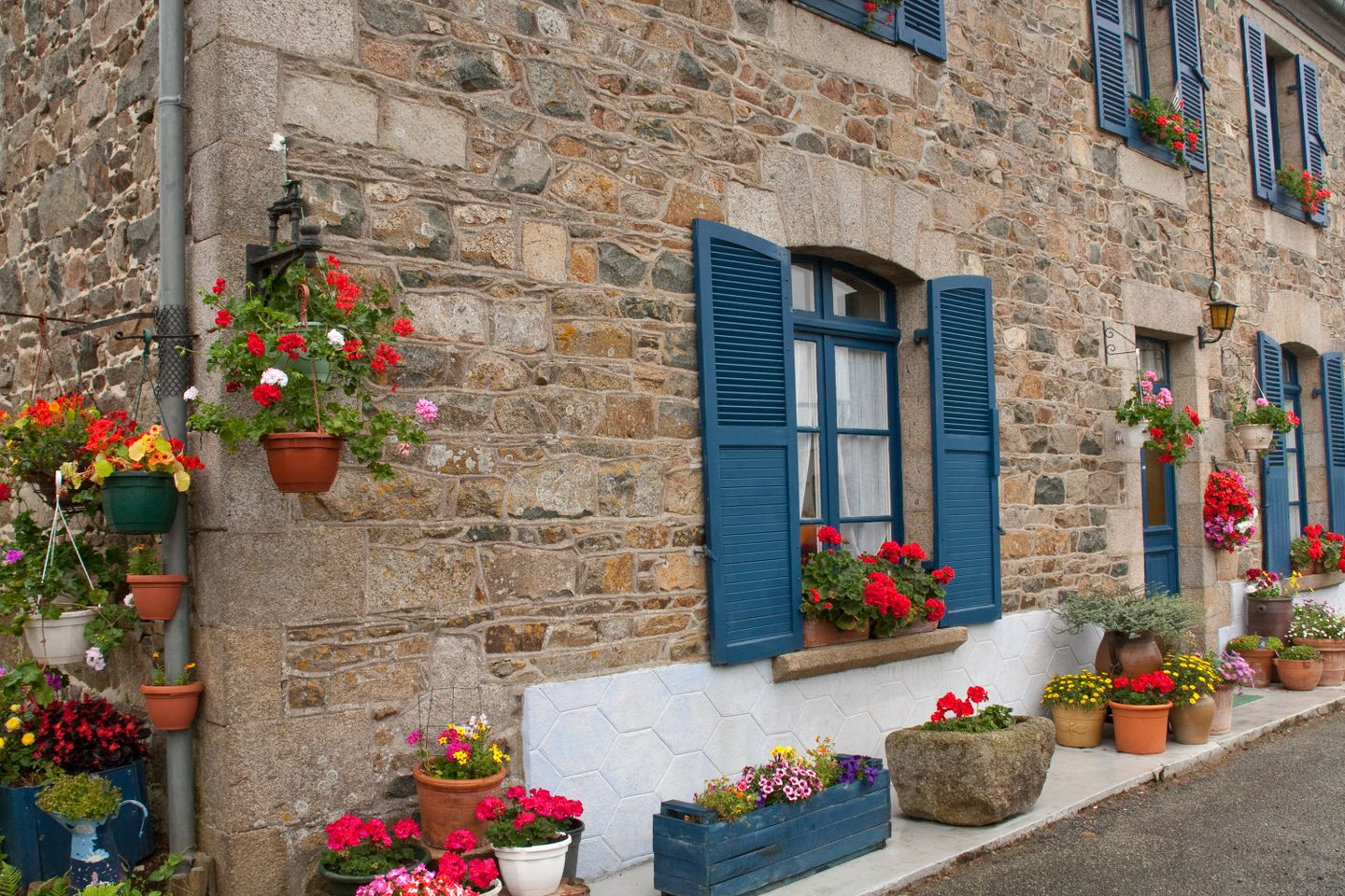 Flowers decorating a street in Normandy, France.