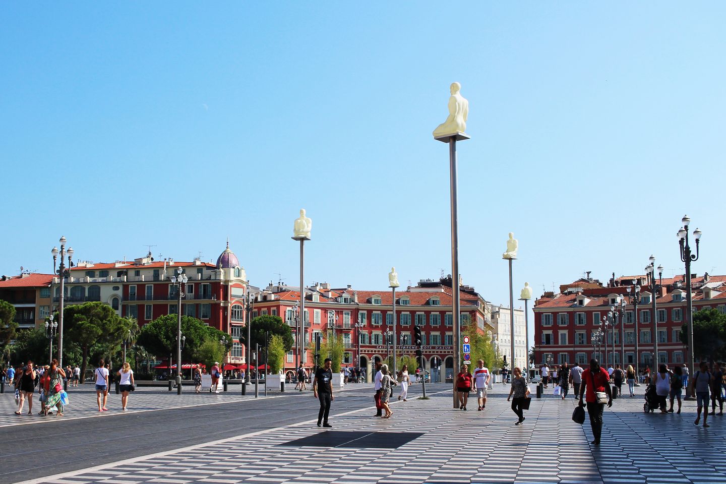 People walking down Avenue Jean Médecin, a main shopping street in Nice