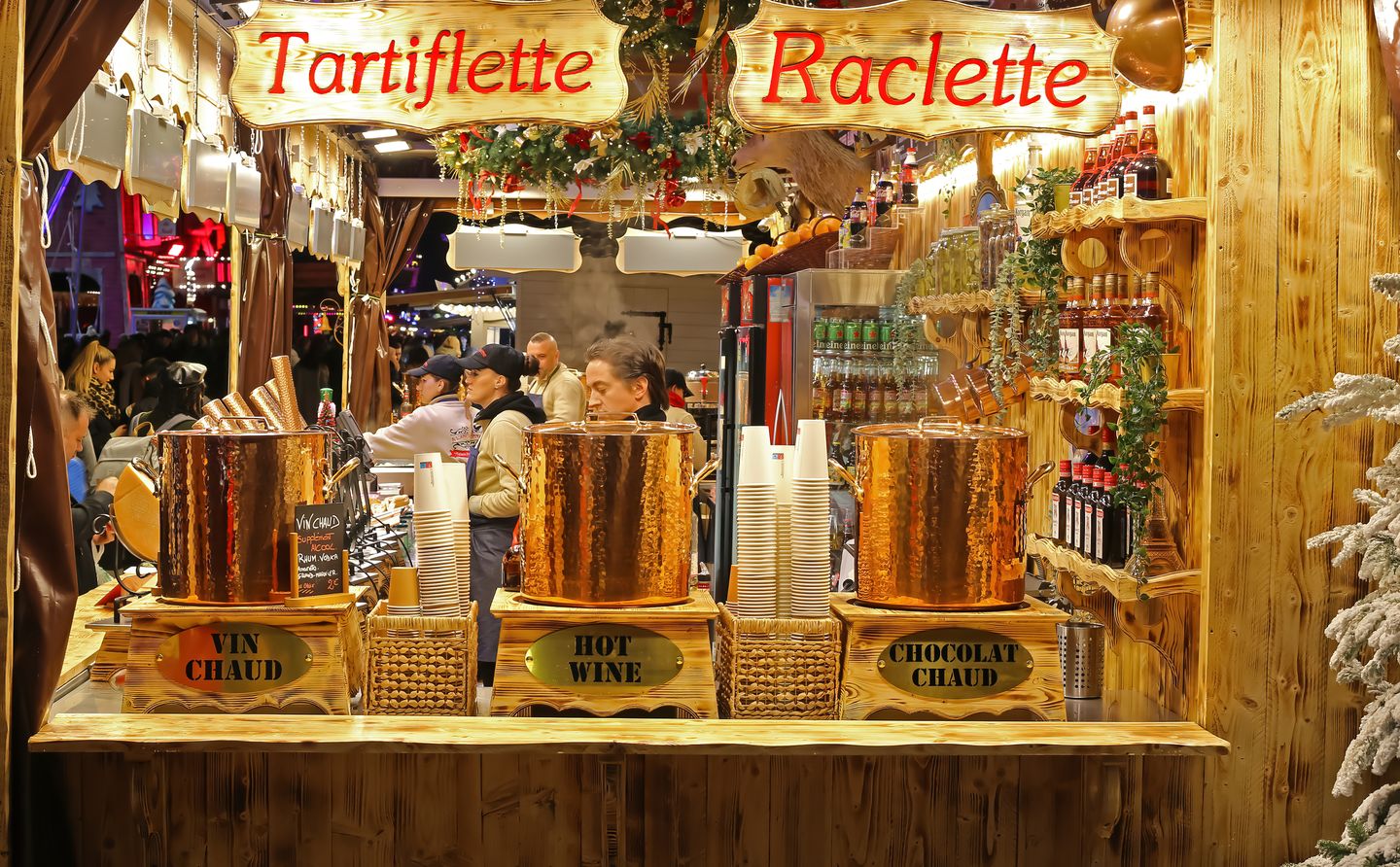 A food and wine stand at the Tuileries Christmas market in Paris.